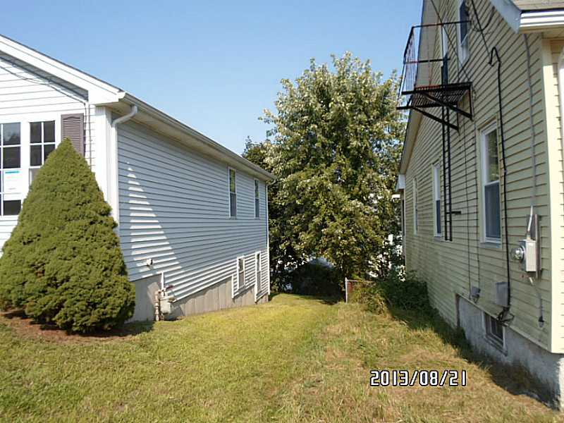 59 7th Avenue Woonsocket, RI 02895 - Photo 10 of 13 Exterior Front.