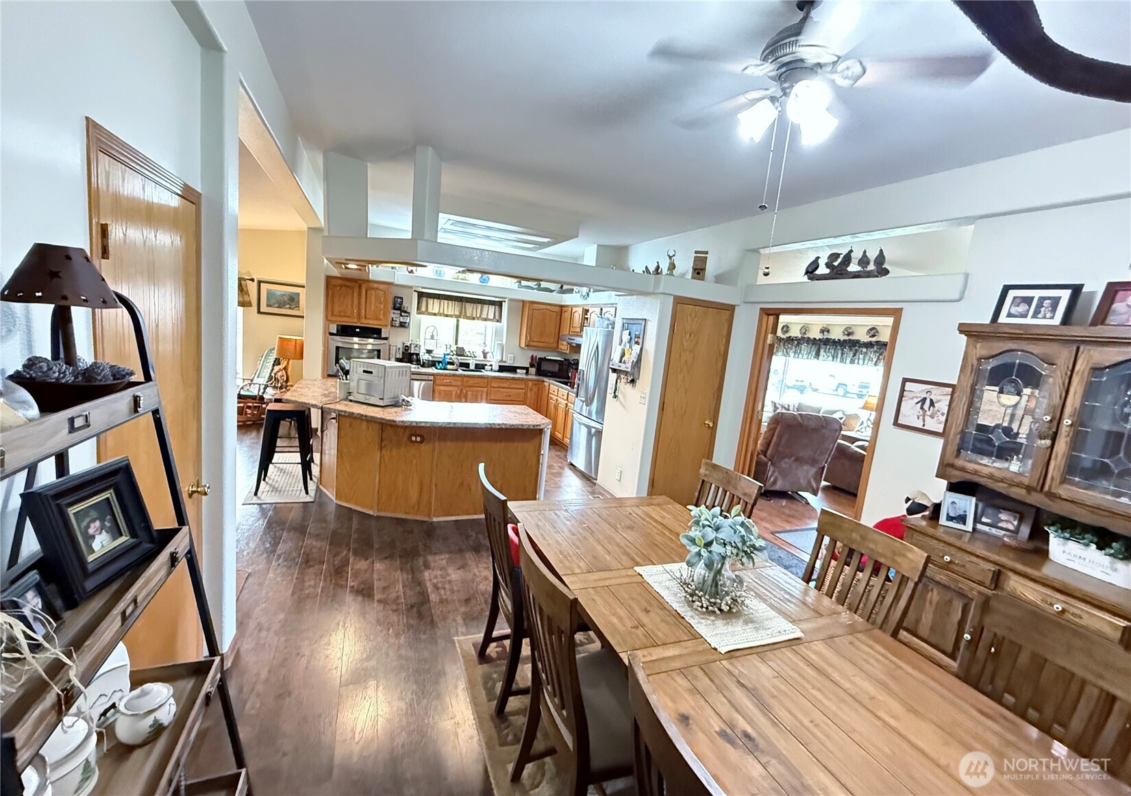 92 Crumbacher Road Tonasket, WA 98855 - Photo 11 of 40 a view of a dining room with furniture window and wooden floor