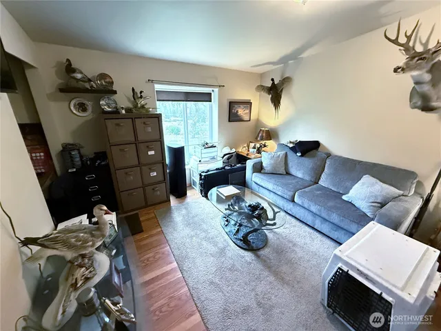 a living room with furniture and a couch