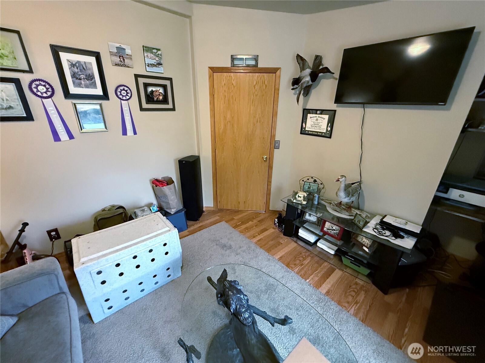92 Crumbacher Road Tonasket, WA 98855 - Photo 21 of 40 a bedroom with furniture and flat screen tv