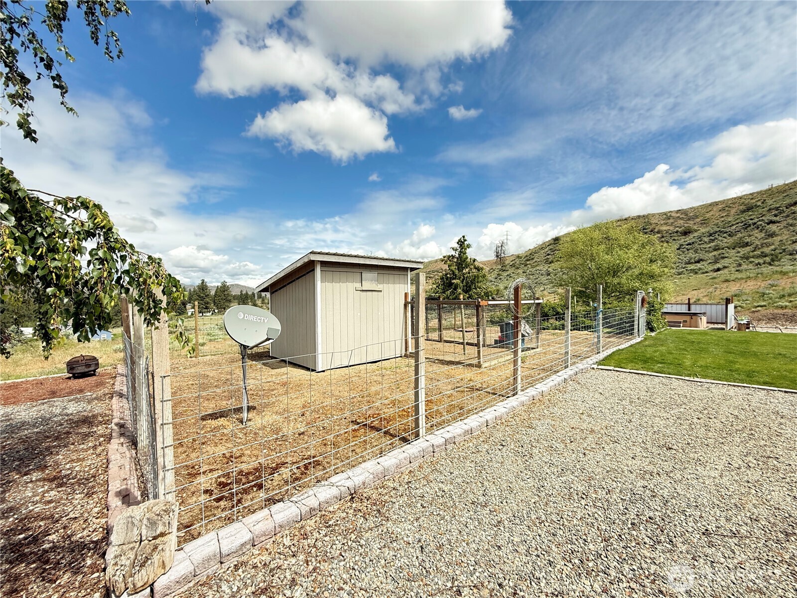 92 Crumbacher Road Tonasket, WA 98855 - Photo 25 of 40 a view of a backyard