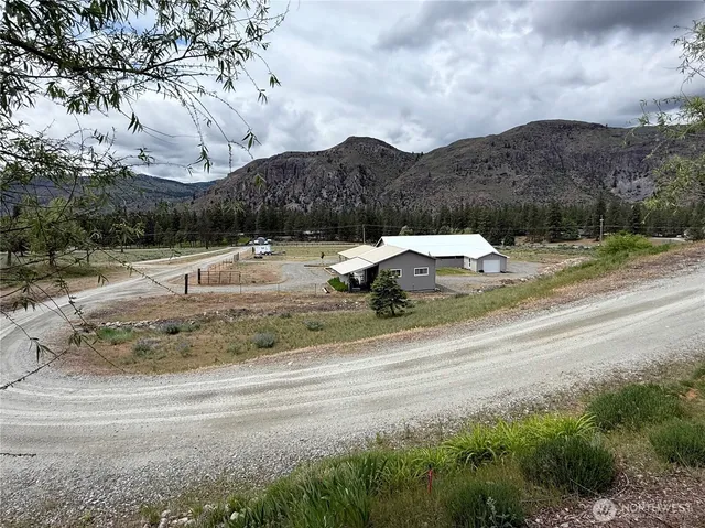 a view of a houses with a yard