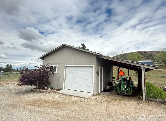 a view of a house with wooden floor and roof