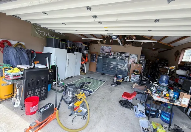 a view of a storage room with storage and utility room
