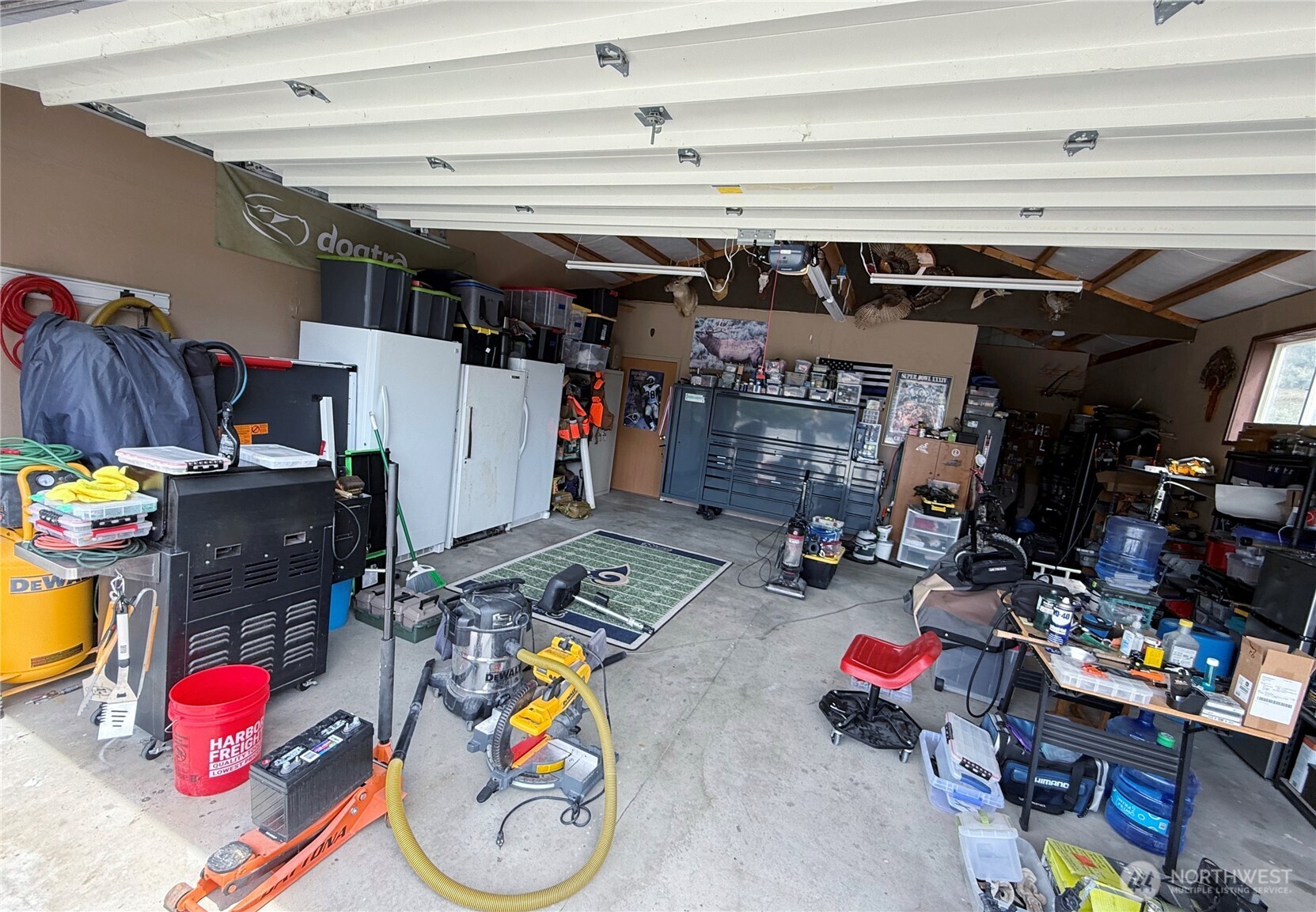 92 Crumbacher Road Tonasket, WA 98855 - Photo 32 of 40 a view of a storage room with storage and utility room