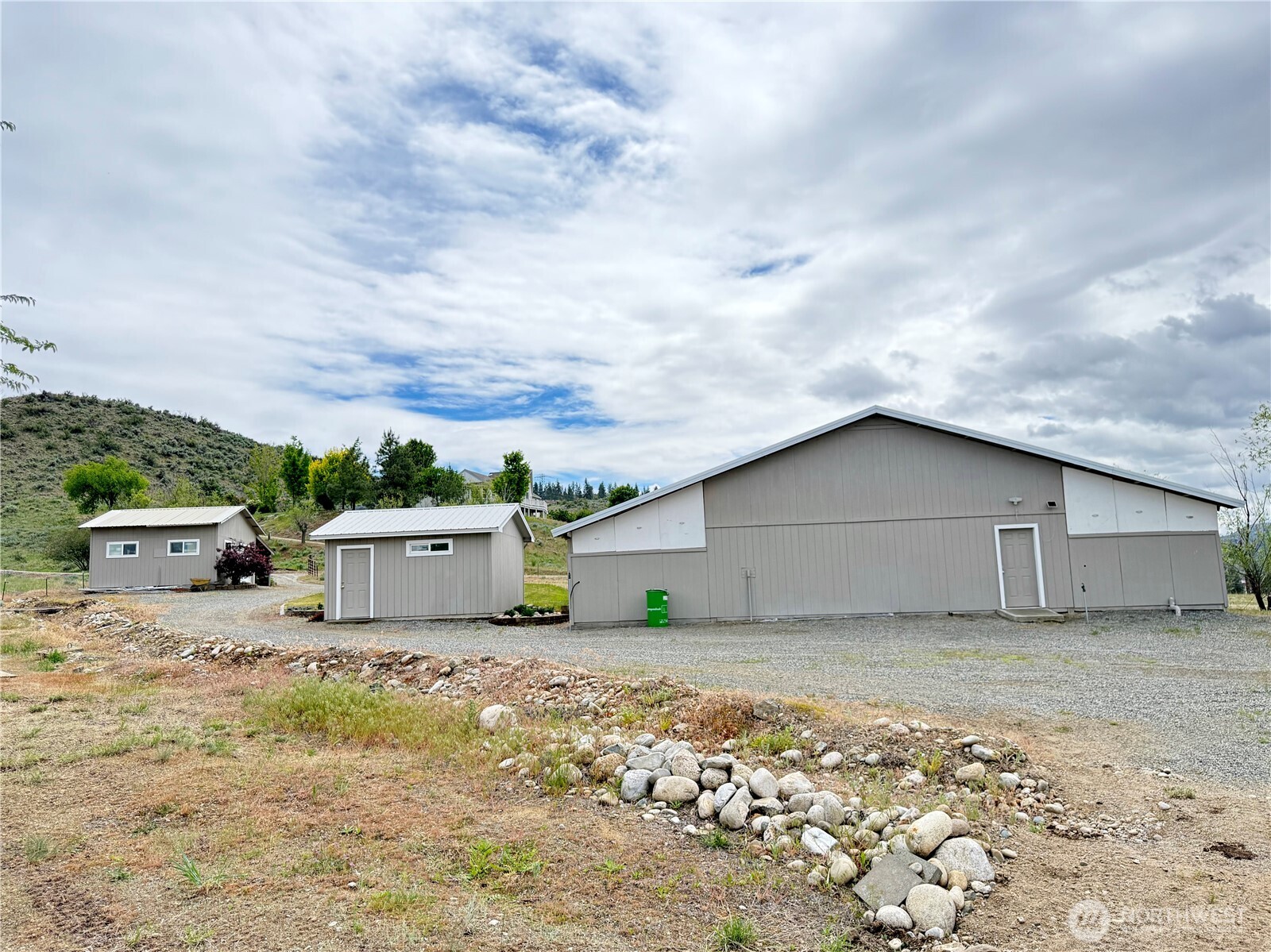 92 Crumbacher Road Tonasket, WA 98855 - Photo 34 of 40 a view of a house with a yard