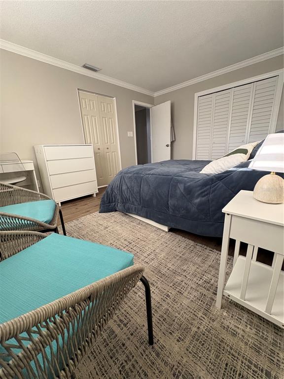 1500 Gay Road, Unit 20D Winter Park, FL 32789 - Photo 12 of 22 a bedroom with a bed and a window