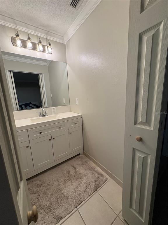 1500 Gay Road, Unit 20D Winter Park, FL 32789 - Photo 14 of 22 a utility room with cabinets washer and dryer
