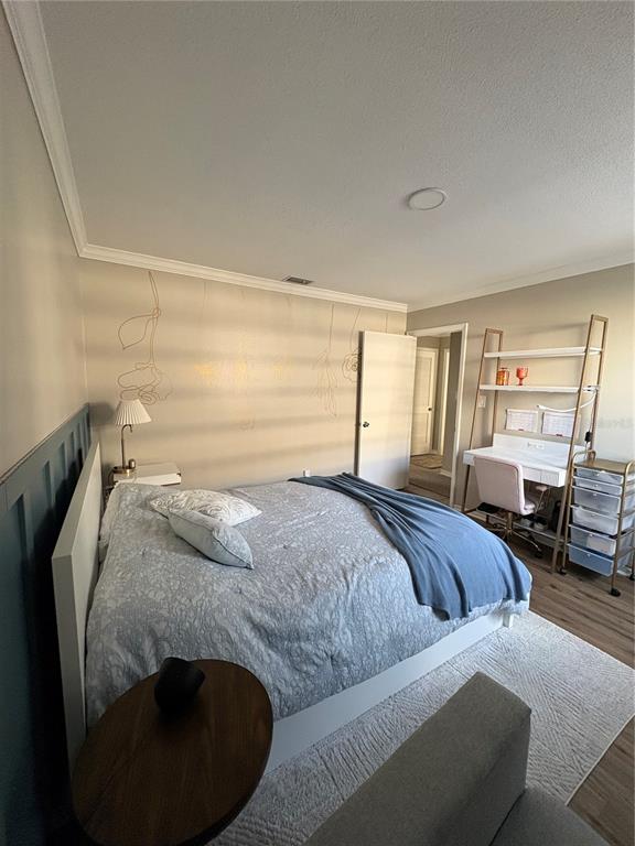 1500 Gay Road, Unit 20D Winter Park, FL 32789 - Photo 16 of 22 a spacious bedroom with a bed and window