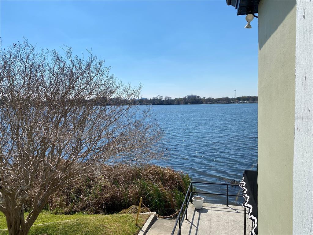 1500 Gay Road, Unit 20D Winter Park, FL 32789 - Photo 18 of 22 a view of a lake from a yard