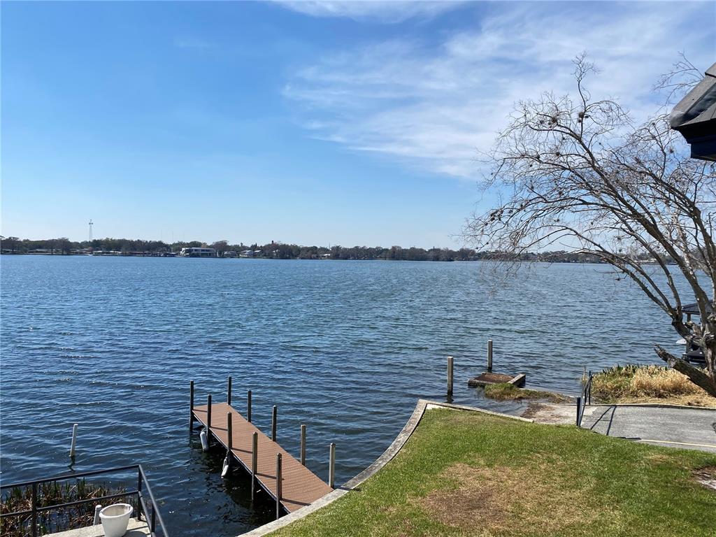 1500 Gay Road, Unit 20D Winter Park, FL 32789 - Photo 19 of 22 a view of lake from deck with outdoor seating
