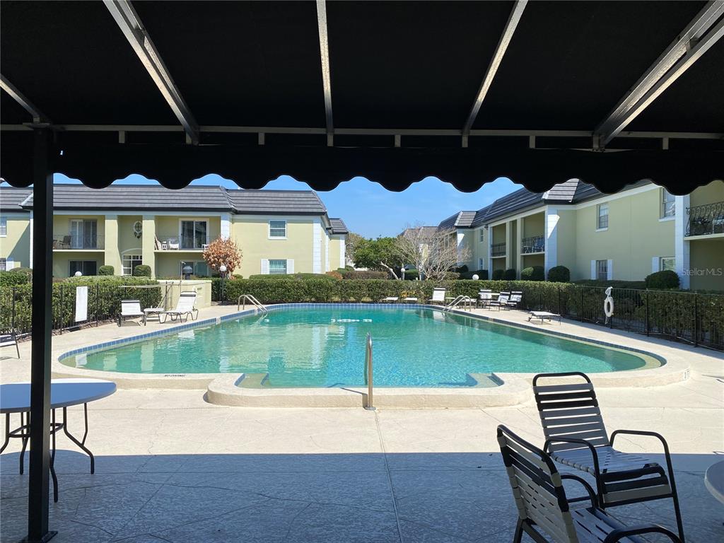 1500 Gay Road, Unit 20D Winter Park, FL 32789 - Photo 21 of 22 a view of a patio with swimming pool