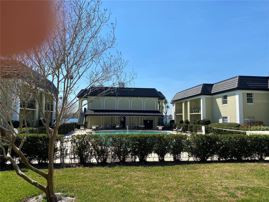 1500 Gay Road, Unit 20D Winter Park, FL 32789 - Photo 22 of 22 a front view of a house with a yard