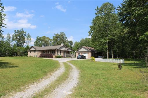 2344 Doyle Frazier Road Morrison, TN 37357 - Photo 2 of 24 Long private driveway leads to this beautiful home. Trees to the front and back of home gives added privacy on 8.24 acres