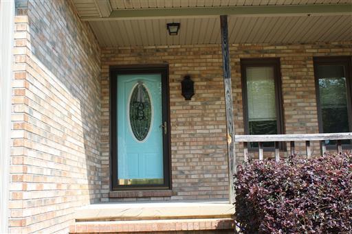 2344 Doyle Frazier Road Morrison, TN 37357 - Photo 3 of 24 Inviting front porch leads into foyer. There is a side porch that wraps around to the back of house too.