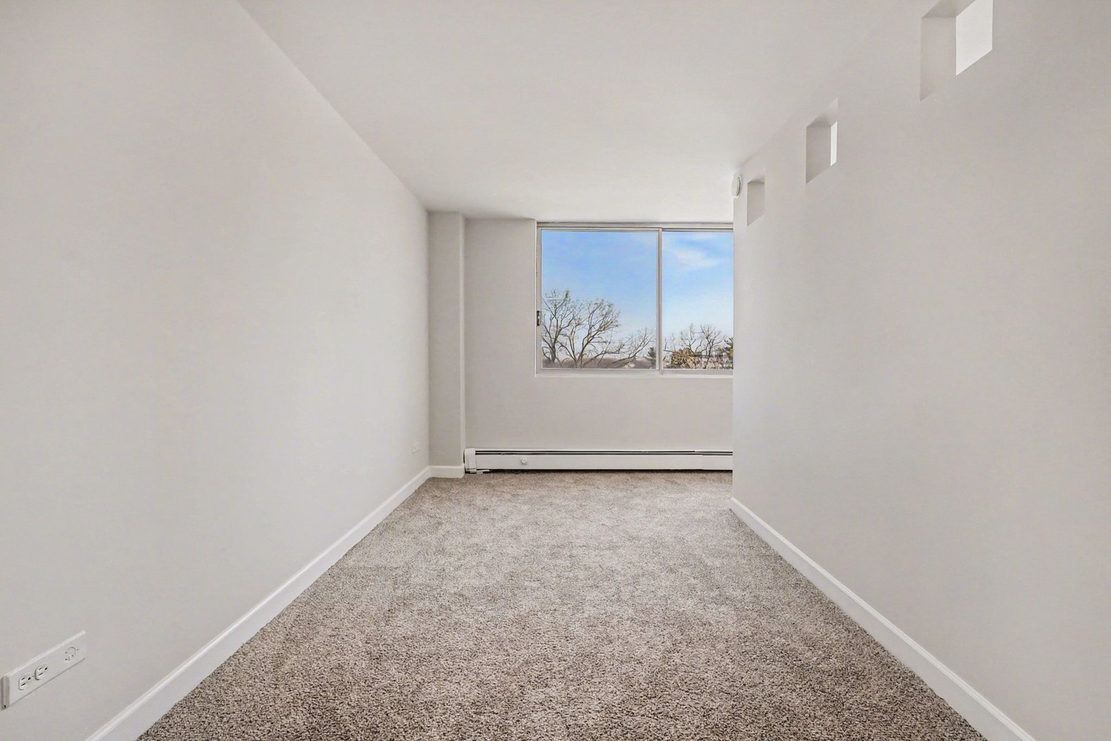 20 North Tower Road, Unit 4C Oak Brook, IL 60523 - Photo 12 of 16 a view of an empty room