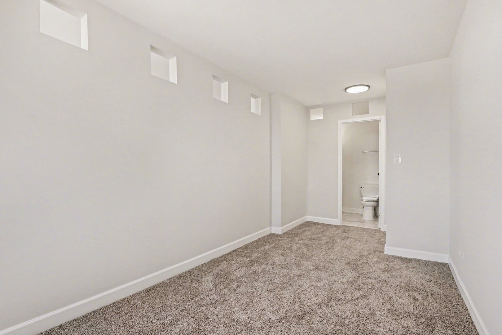 20 North Tower Road, Unit 4C Oak Brook, IL 60523 - Photo 13 of 16 a view of an empty room