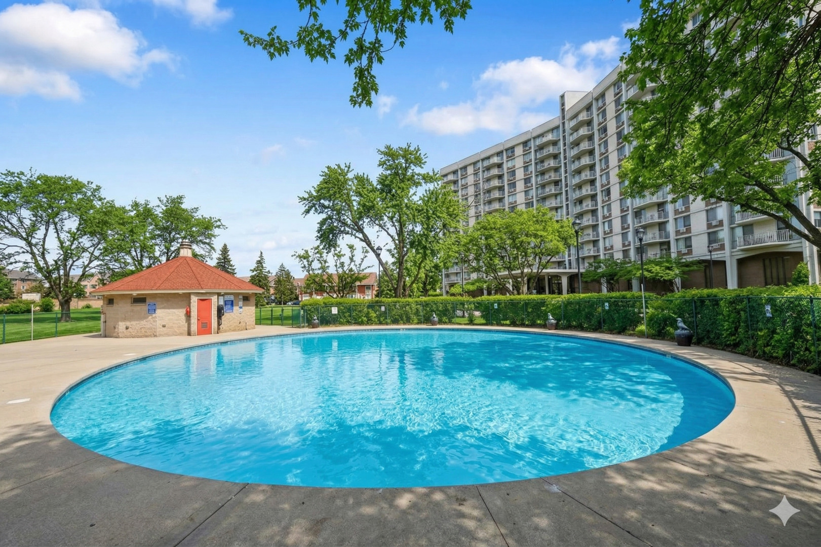 20 North Tower Road, Unit 4C Oak Brook, IL 60523 - Photo 6 of 16 a view of a swimming pool with a yard
