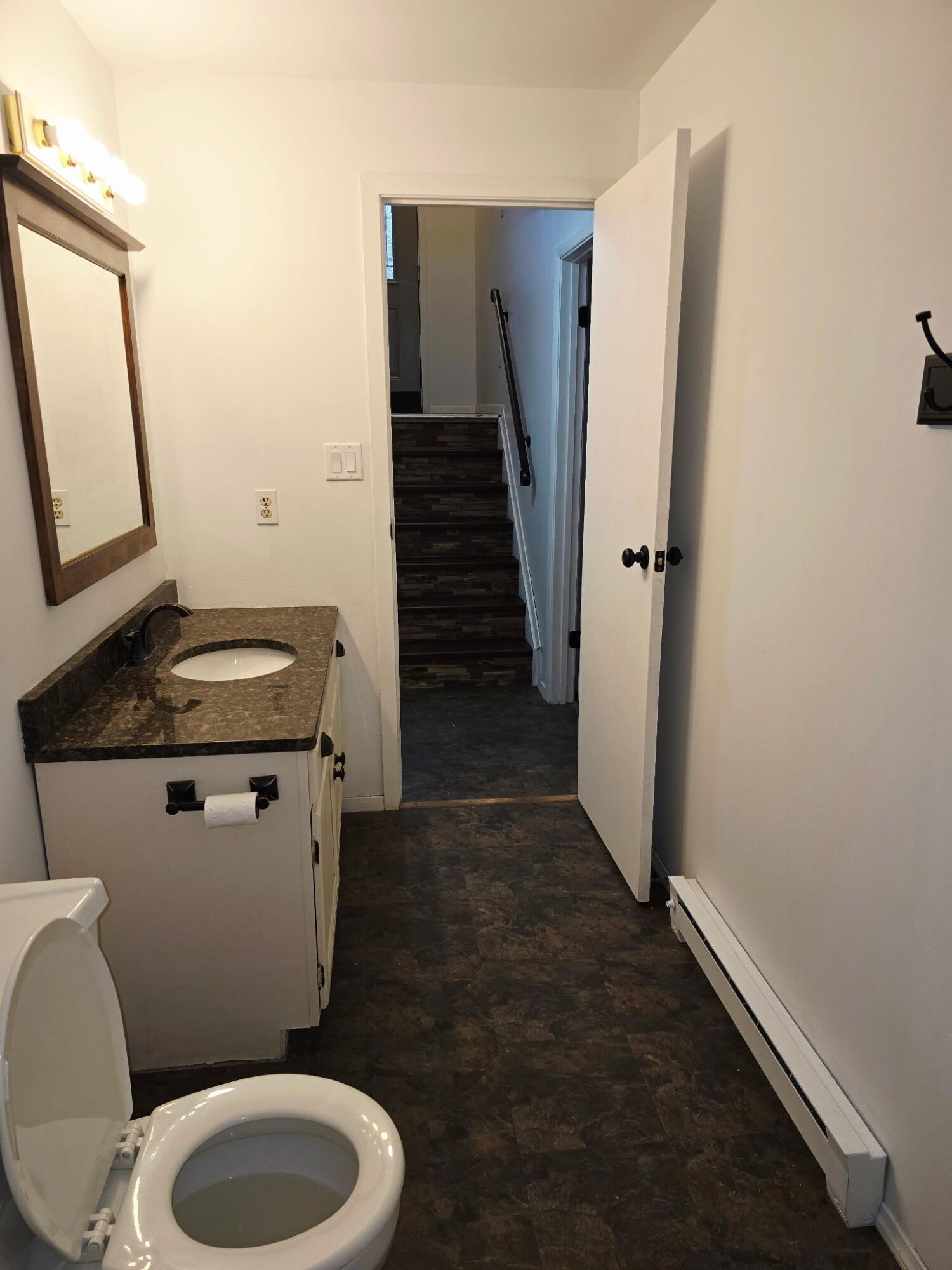 11535 Sandhill Trail Demotte, IN 46310 - Photo 19 of 31 a bathroom with a toilet and a mirror