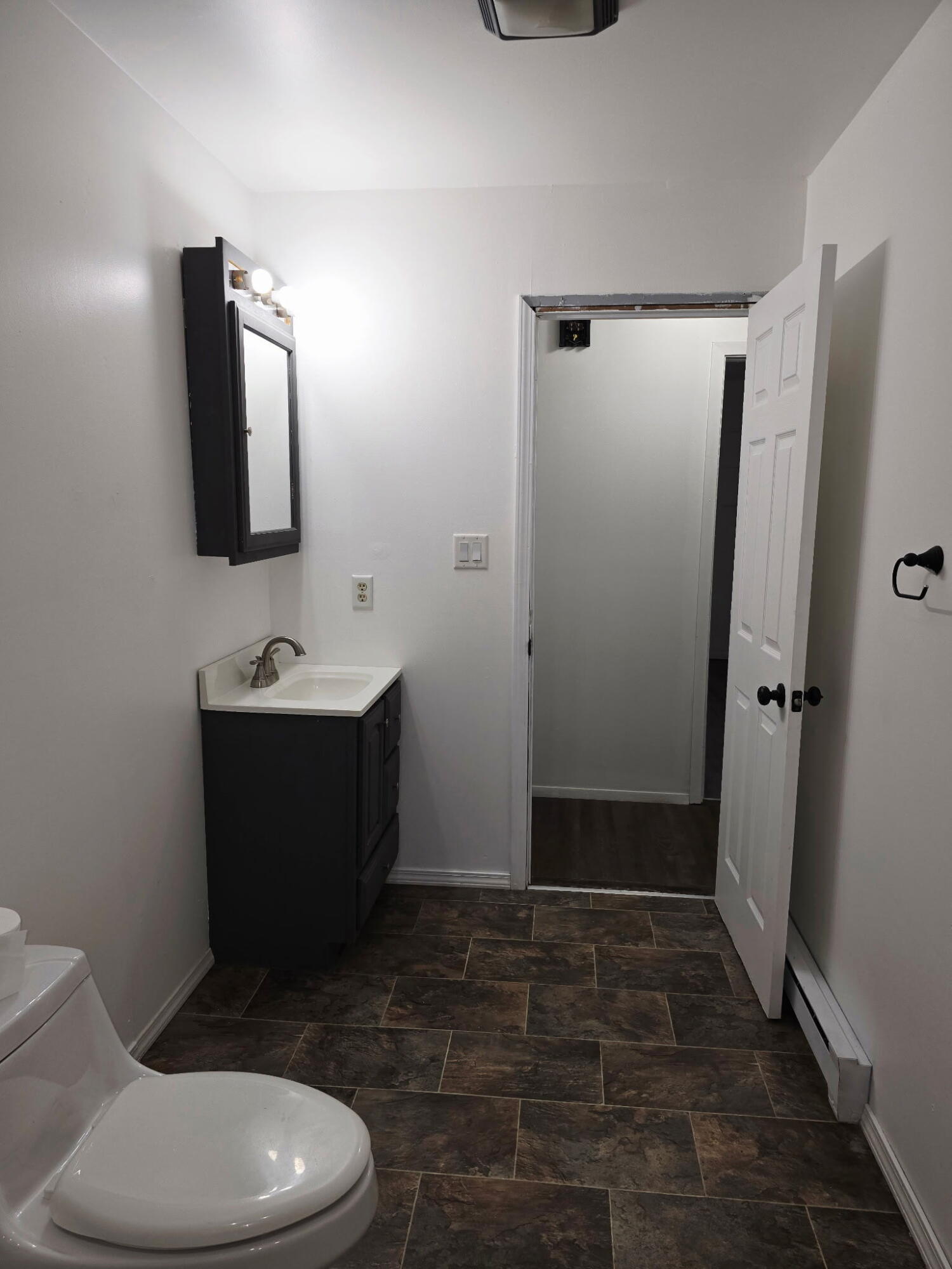 11535 Sandhill Trail Demotte, IN 46310 - Photo 20 of 31 a bathroom with a toilet sink and shower
