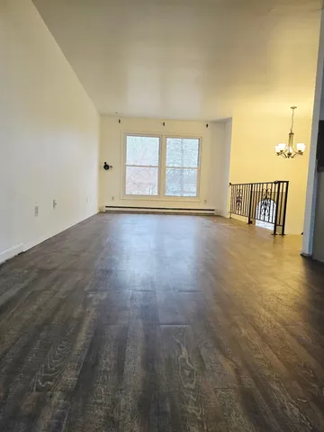 a bathroom with a toilet a sink and bathtub