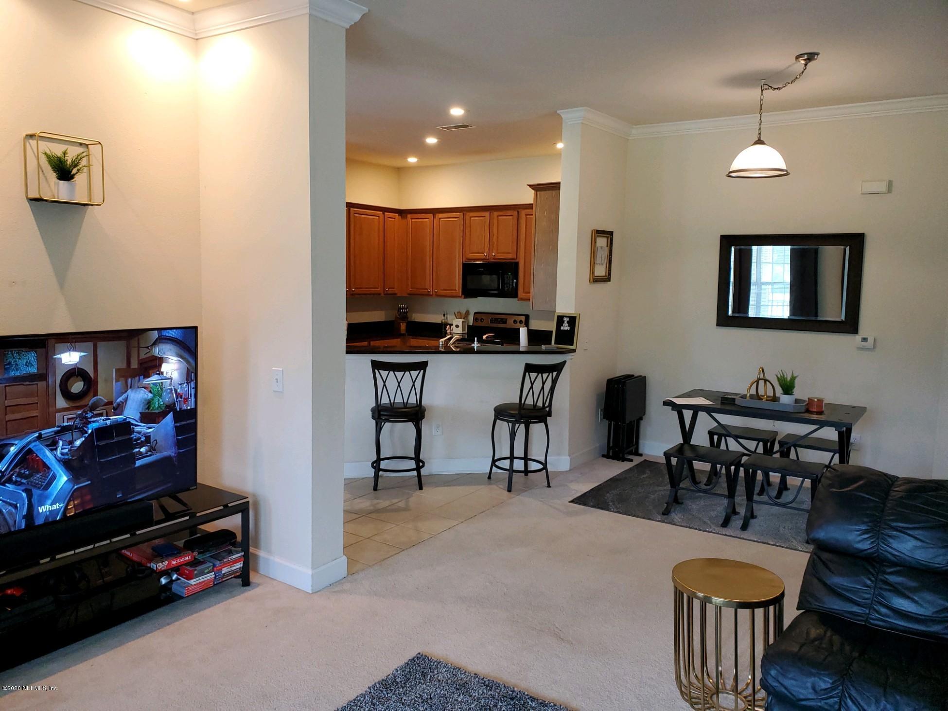 2008 Pond Ridge Court, Unit 1306 Fleming Island, FL 32003 - Photo 5 of 12 Pond Ridge 2008 - Part of Great Room & D