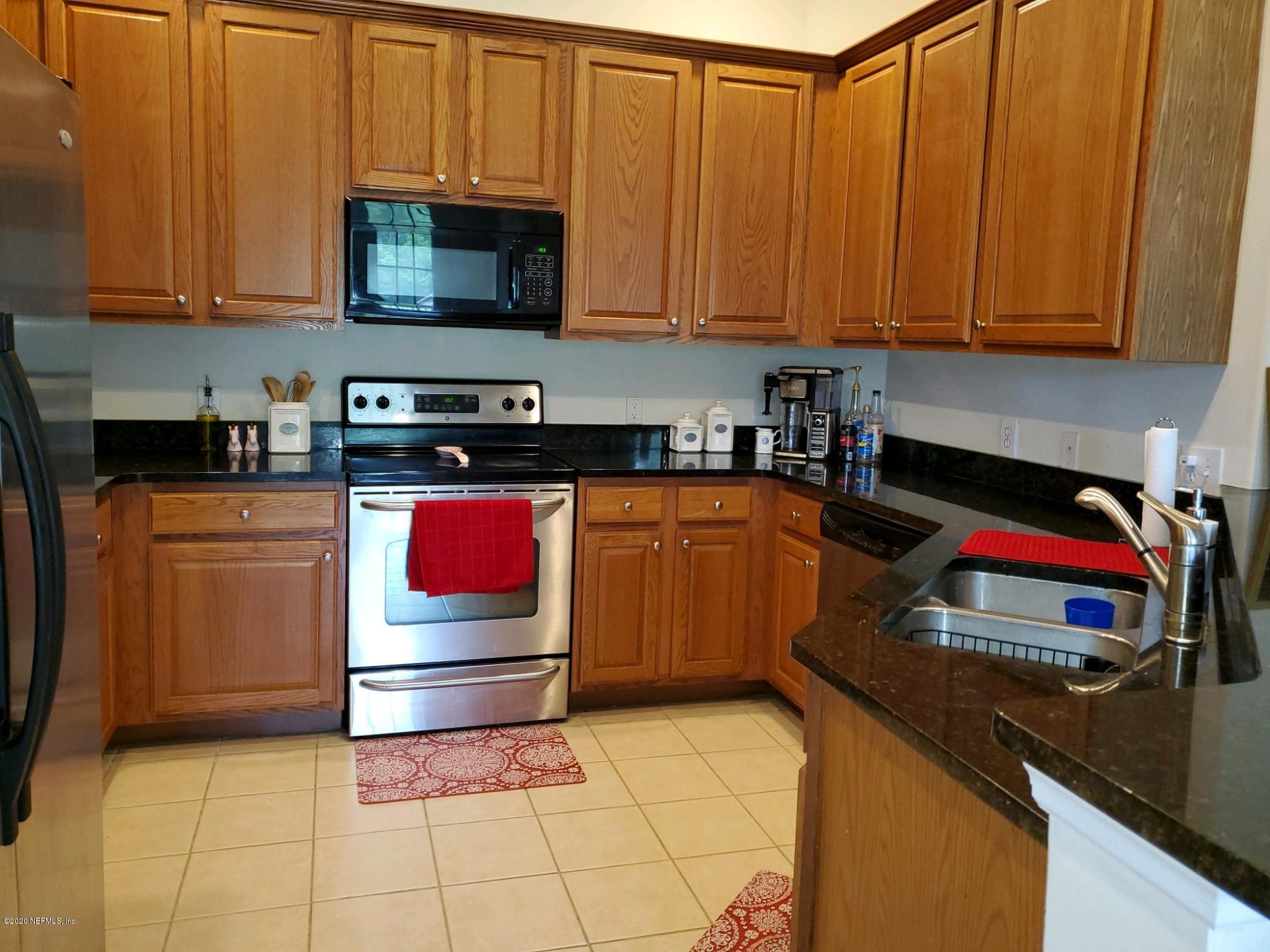 2008 Pond Ridge Court, Unit 1306 Fleming Island, FL 32003 - Photo 6 of 12 Pond Ridge 2008 - Kitchen