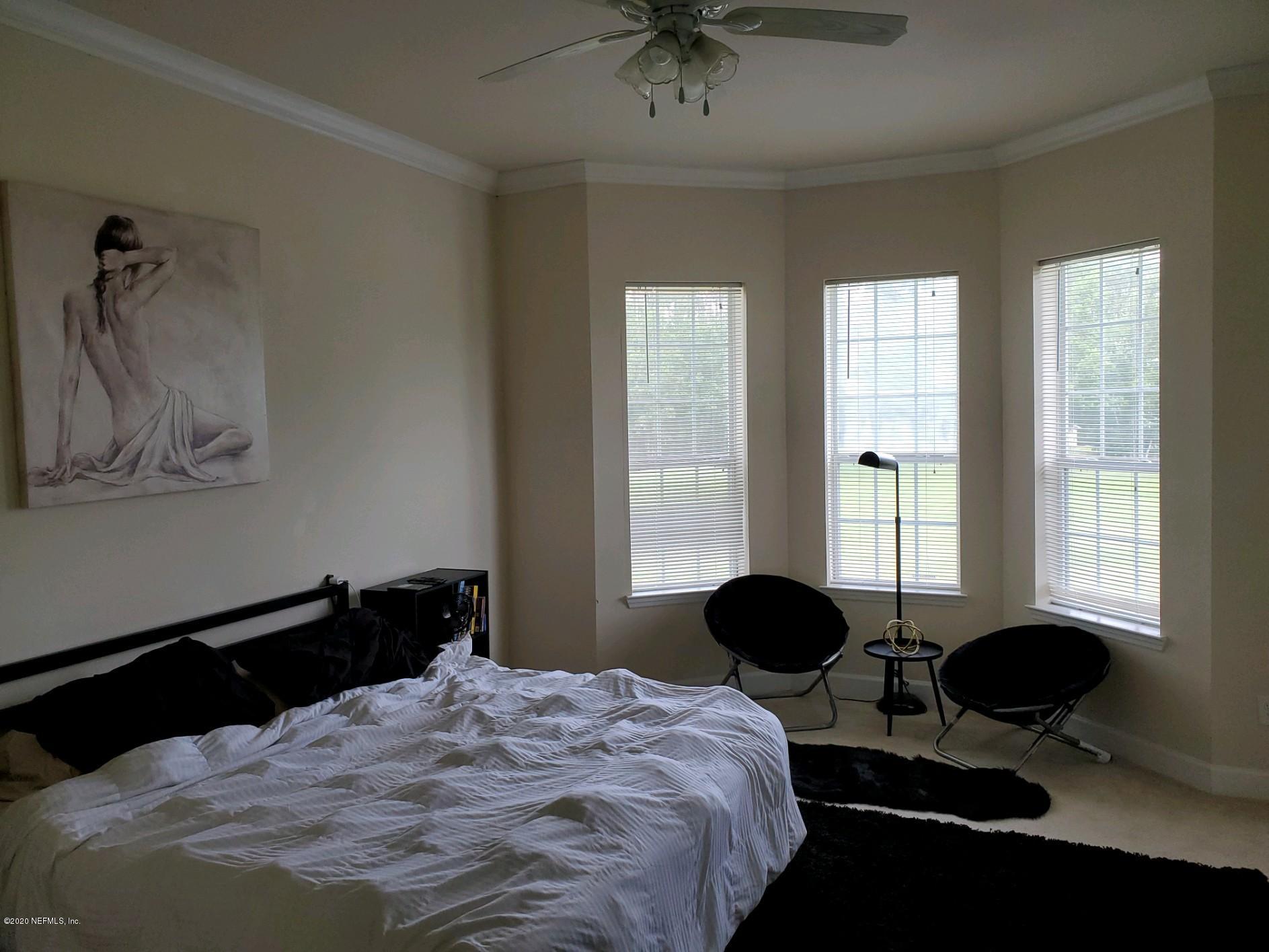 2008 Pond Ridge Court, Unit 1306 Fleming Island, FL 32003 - Photo 7 of 12 Pond Ridge 2008 - Master Bedroom