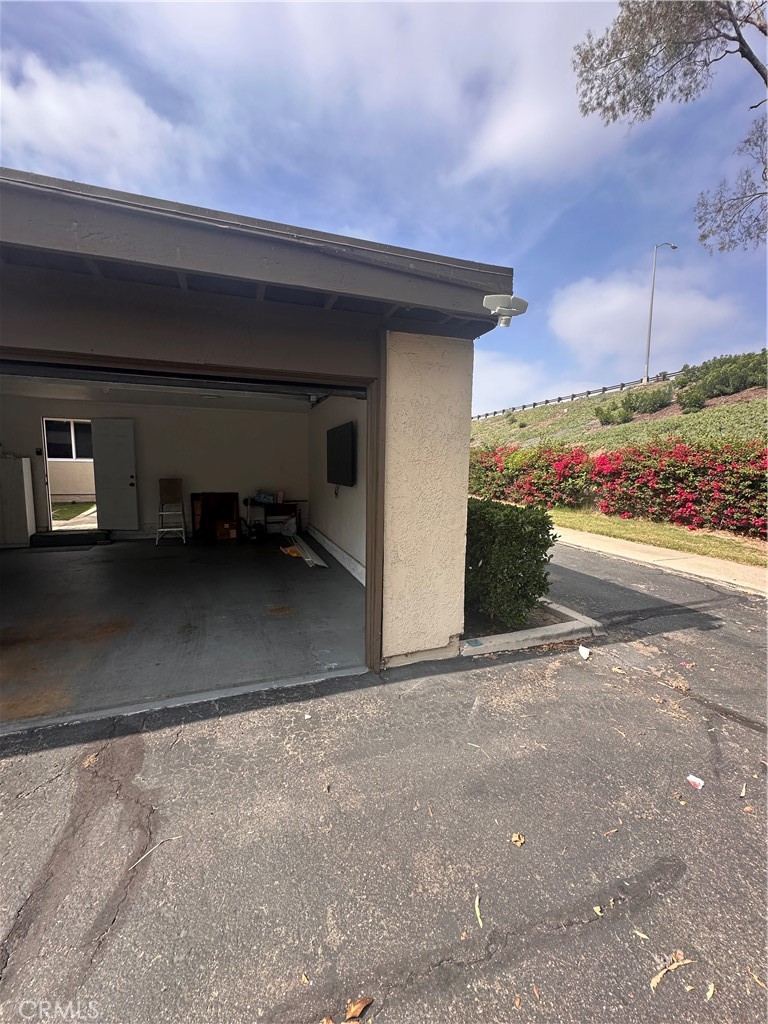 1440 North Weeping Willow Lane Anaheim, CA 92801 - Photo 24 of 31 a view of a car garage door