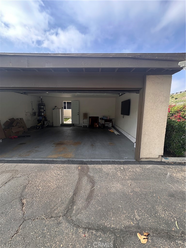1440 North Weeping Willow Lane Anaheim, CA 92801 - Photo 25 of 31 a view of a car garage