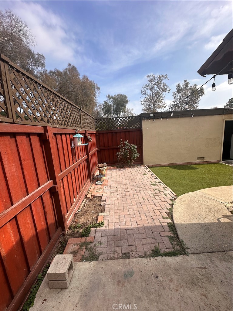 1440 North Weeping Willow Lane Anaheim, CA 92801 - Photo 27 of 31 a view of a backyard with sitting area