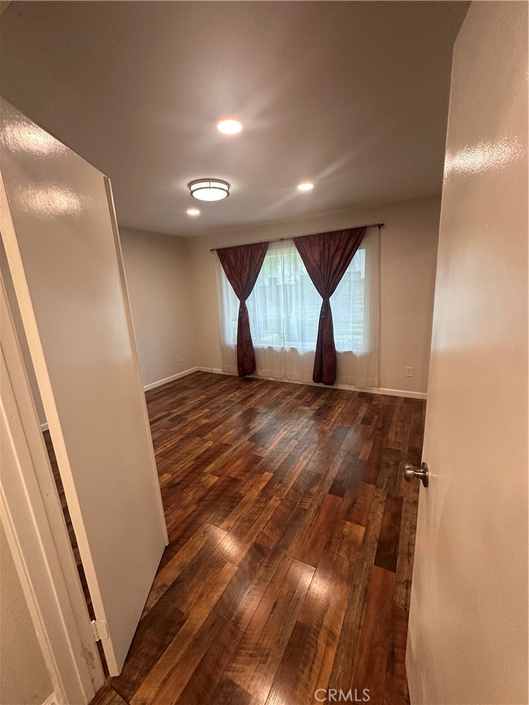 1440 North Weeping Willow Lane Anaheim, CA 92801 - Photo 8 of 31 a view of an empty room and window