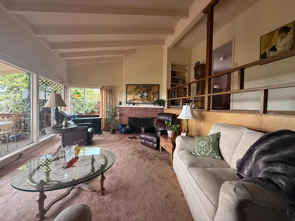 view of a living room with furniture and a flat screen tv