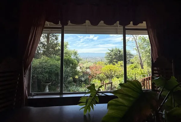 a kitchen with a table and chairs in it