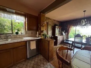 a bathroom with a sink a vanity and a shower