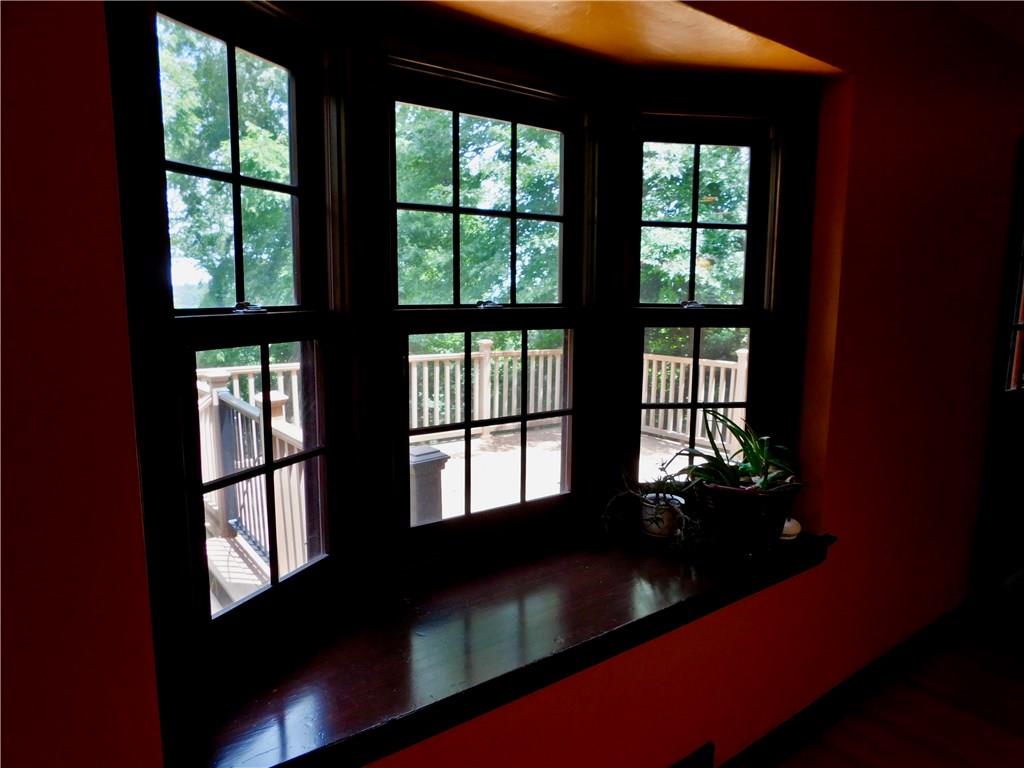 31 Roxbury Road Pittsburgh, PA 15221 - Photo 7 of 25 Looking through the dining room windows onto the large deck.