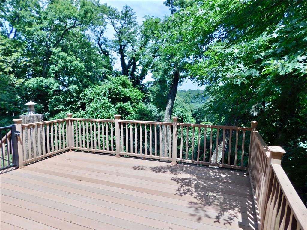 31 Roxbury Road Pittsburgh, PA 15221 - Photo 8 of 25 This spacious deck has steps to the backyard and a nice long view.