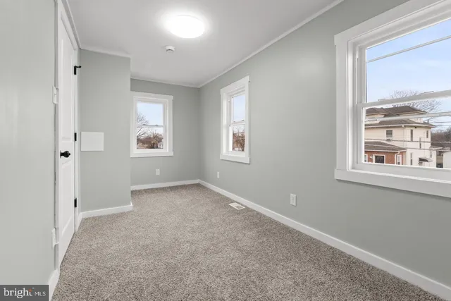 an empty room with windows