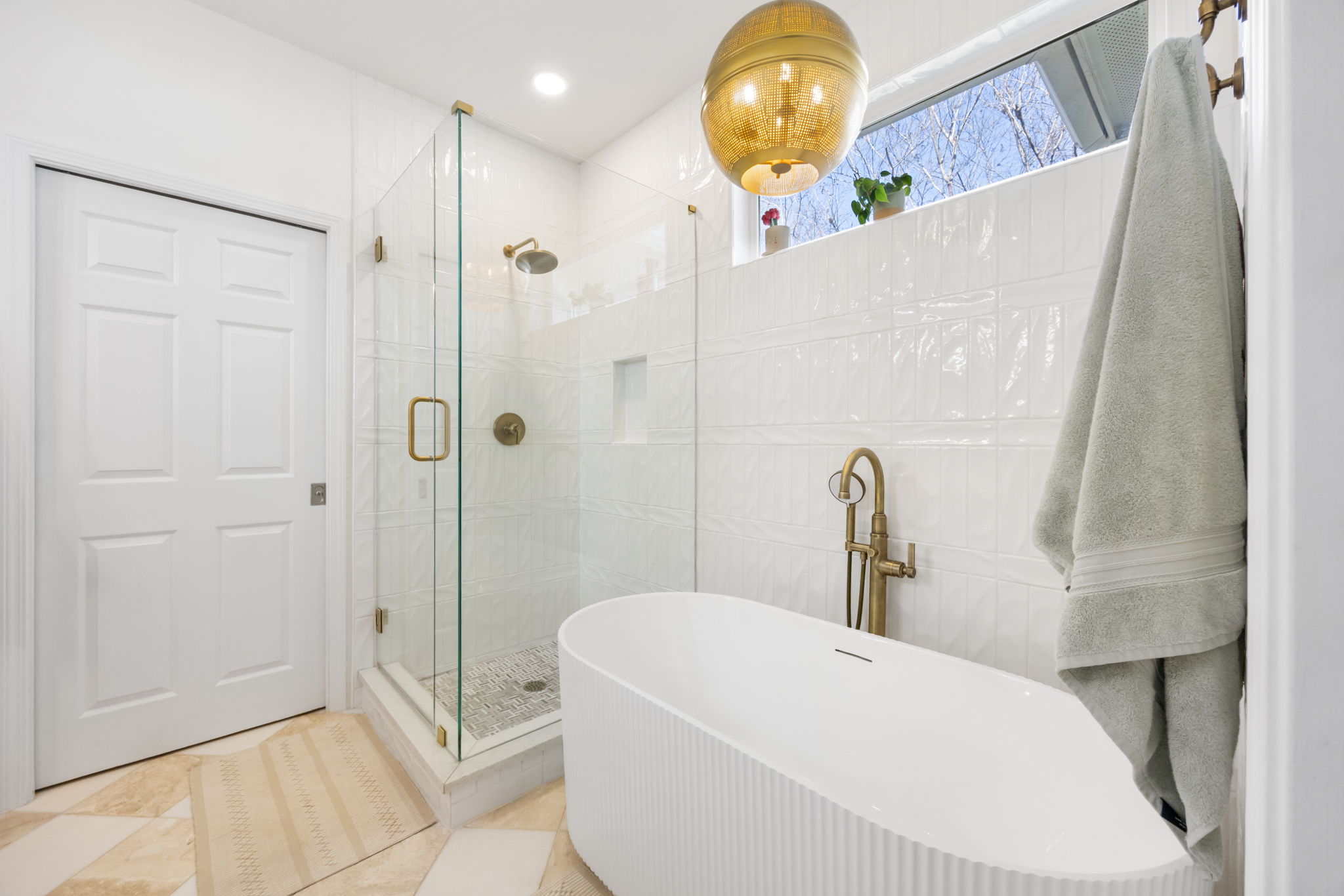 2510 Thornton Road Austin, TX 78704 - Photo 17 of 40 a bathroom with a bathtub and shower