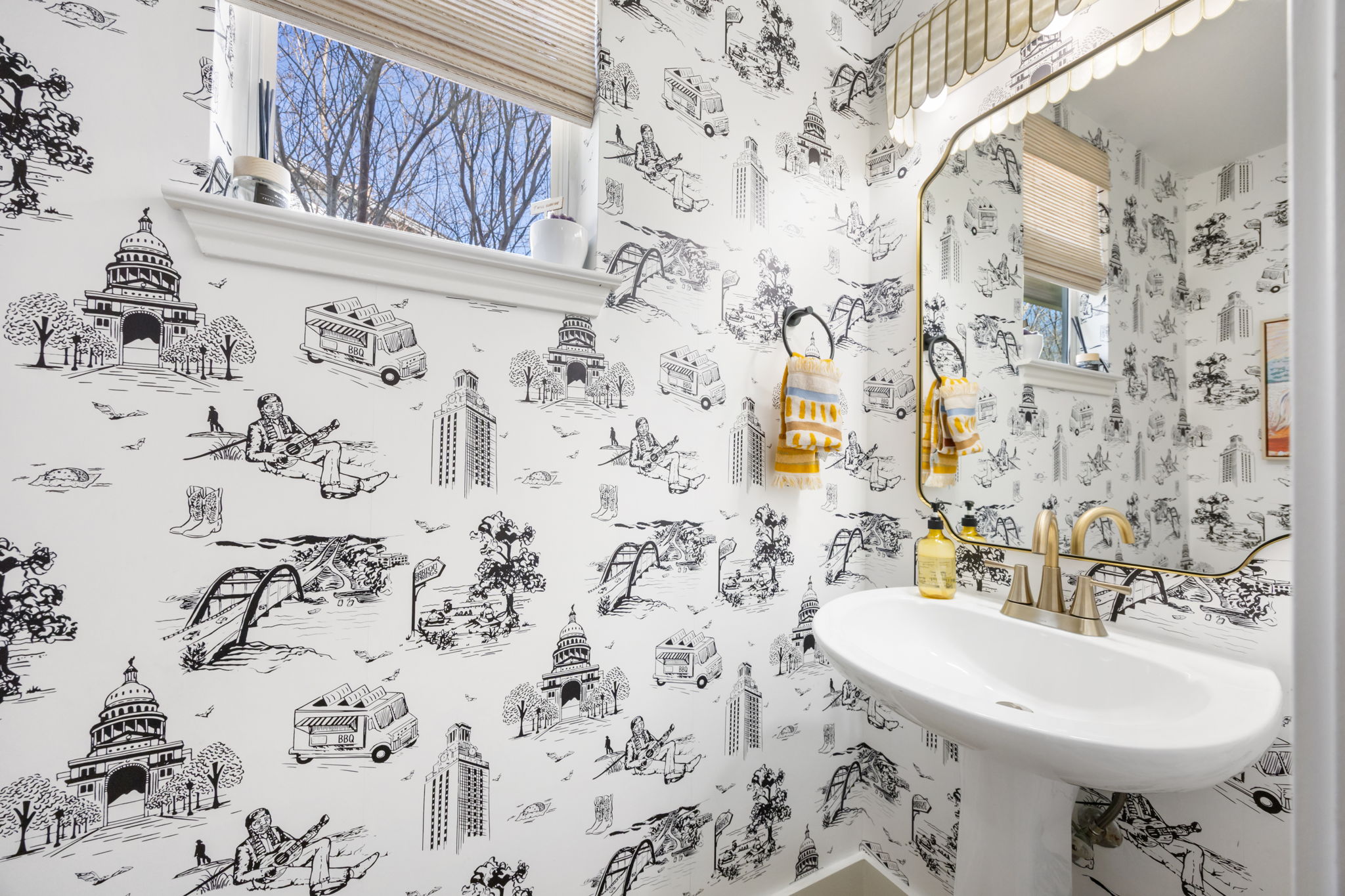 2510 Thornton Road Austin, TX 78704 - Photo 18 of 40 a bathroom with a sink and a mirror