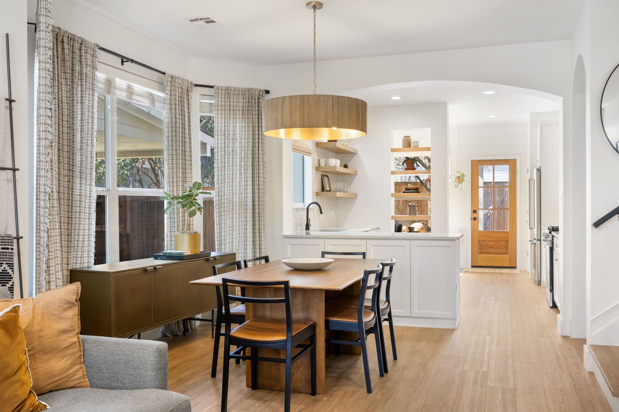 2510 Thornton Road Austin, TX 78704 - Photo 2 of 40 a view of a dining room with furniture and wooden floor