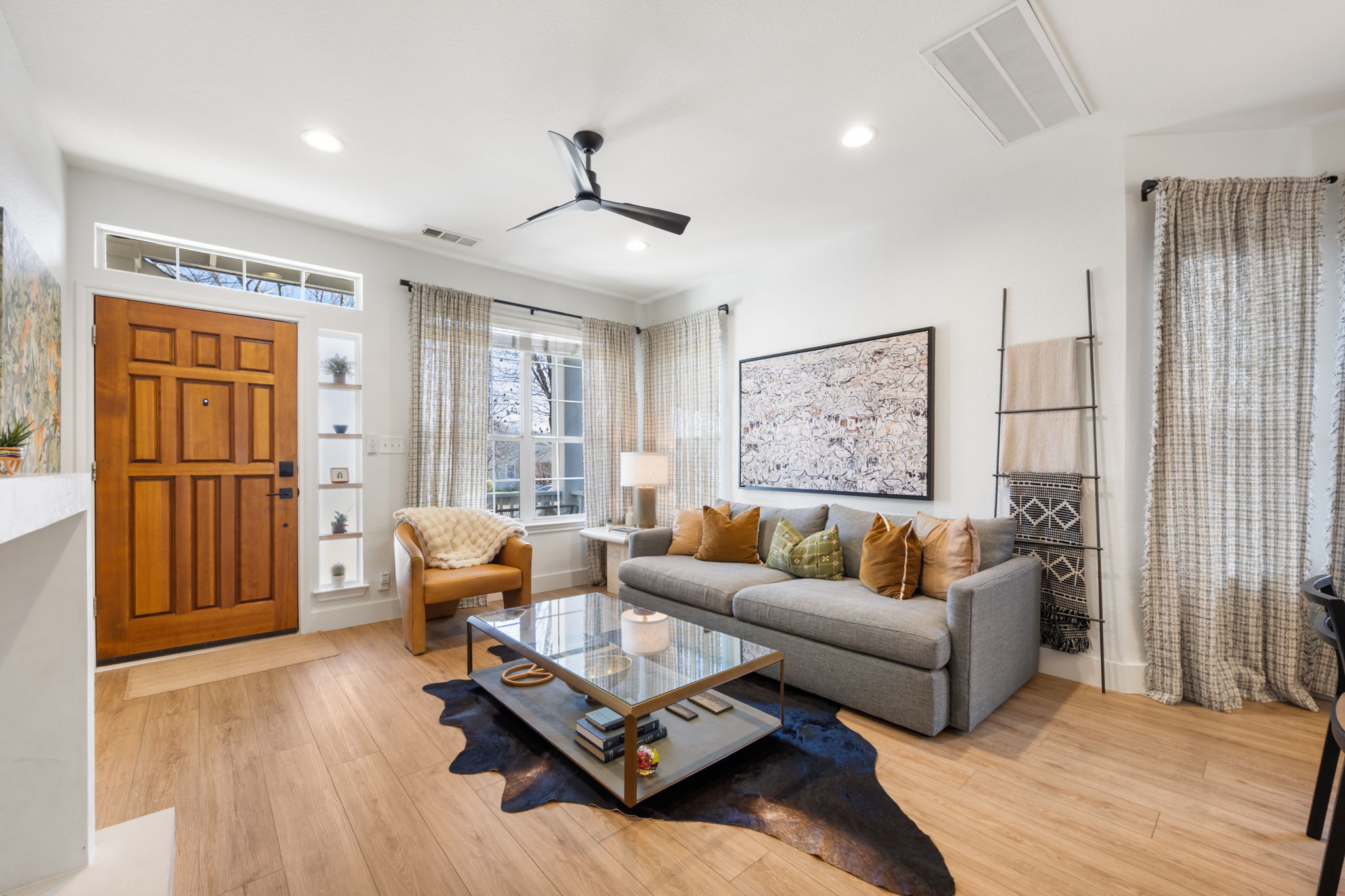 2510 Thornton Road Austin, TX 78704 - Photo 5 of 40 a living room with furniture large window and wooden floor