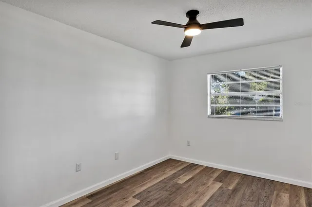 a view of empty room with windows
