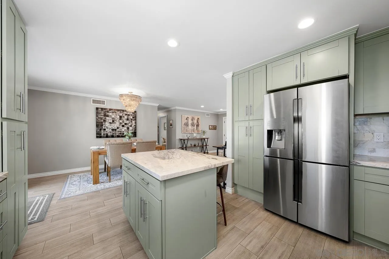 9311 Oakbourne Road Santee, CA 92071 - Photo 13 of 64 a kitchen with a refrigerator a sink and a refrigerator