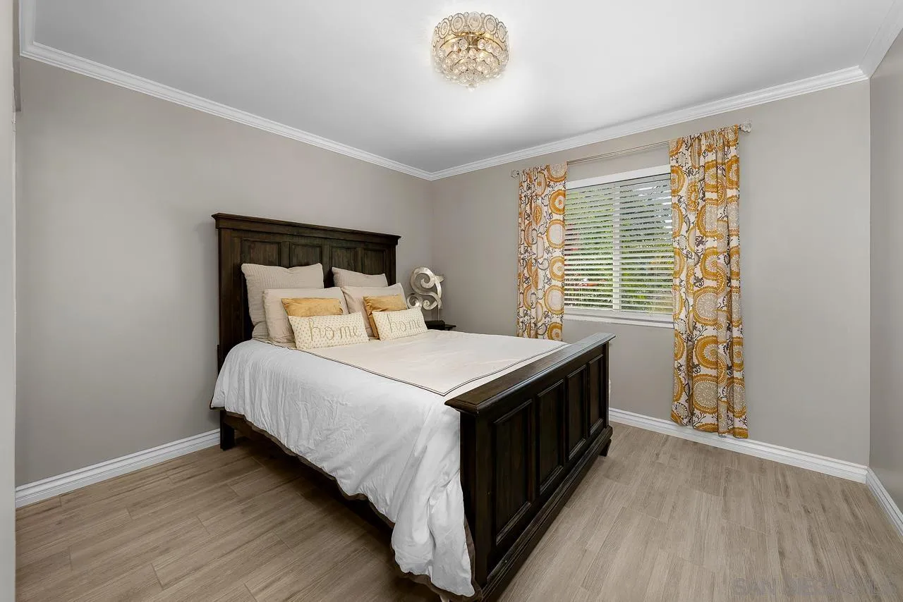 9311 Oakbourne Road Santee, CA 92071 - Photo 24 of 64 a bedroom with a bed and a window