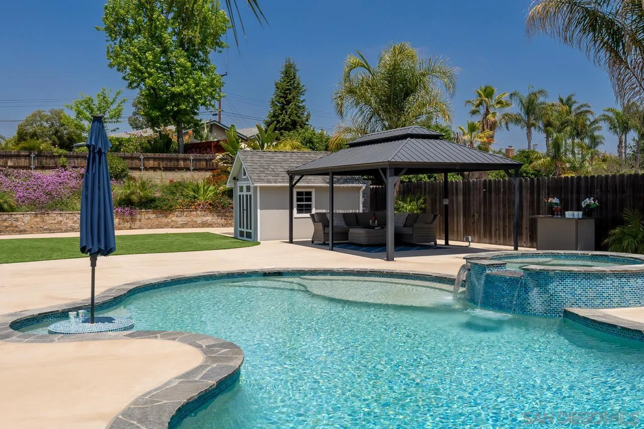 9311 Oakbourne Road Santee, CA 92071 - Photo 45 of 64 a view of a house with a yard patio and a patio