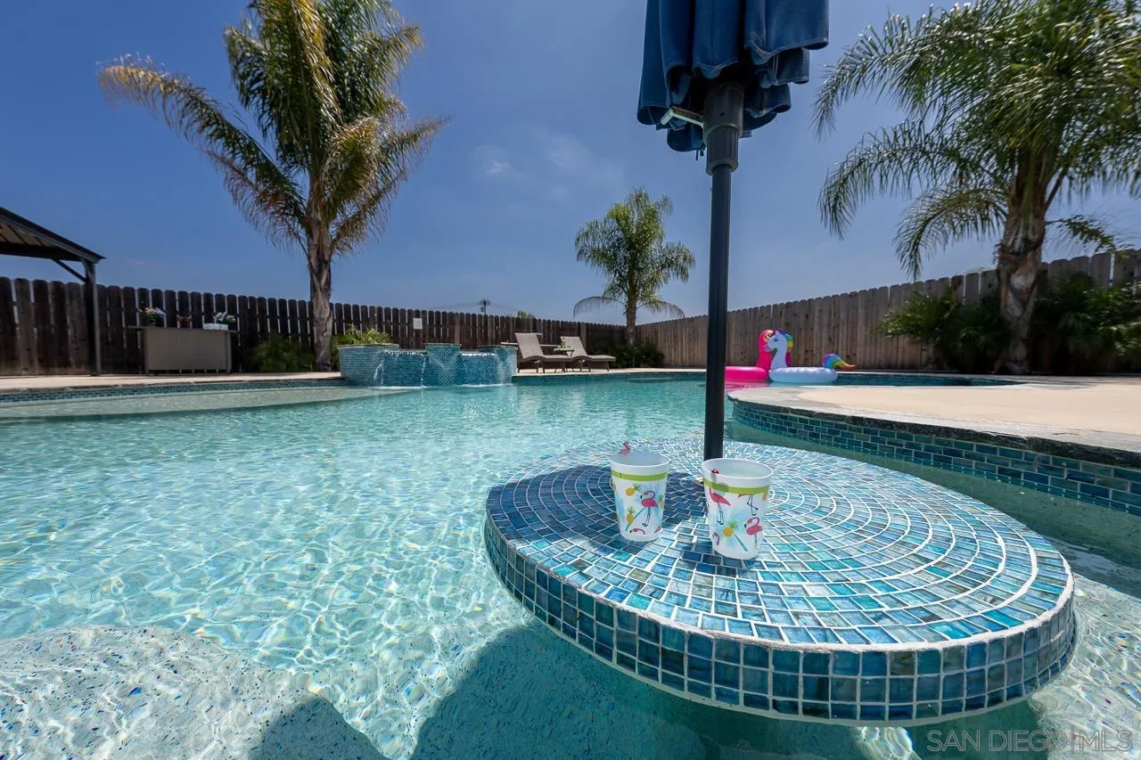 9311 Oakbourne Road Santee, CA 92071 - Photo 47 of 64 a view of a backyard with fountain