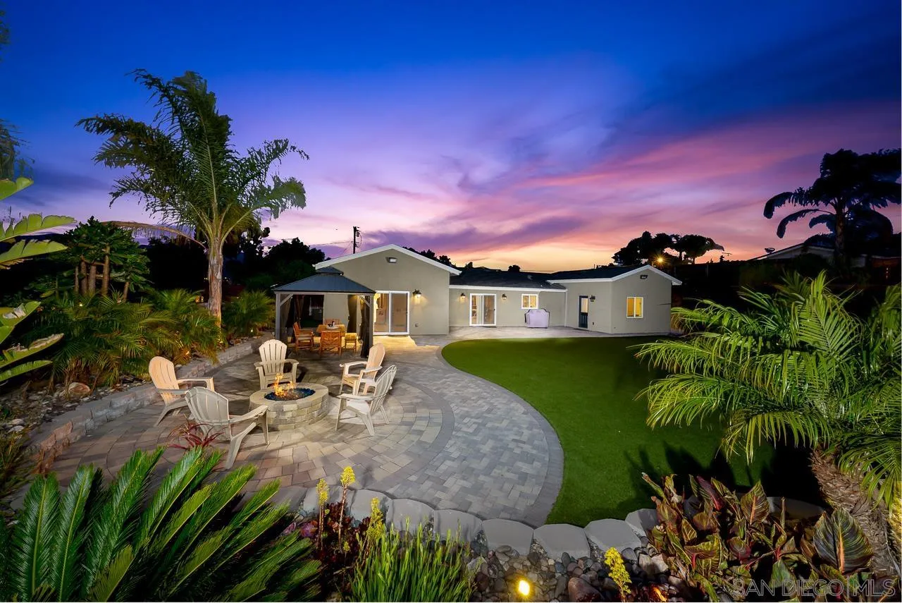 9311 Oakbourne Road Santee, CA 92071 - Photo 50 of 64 a front view of a house with a garden