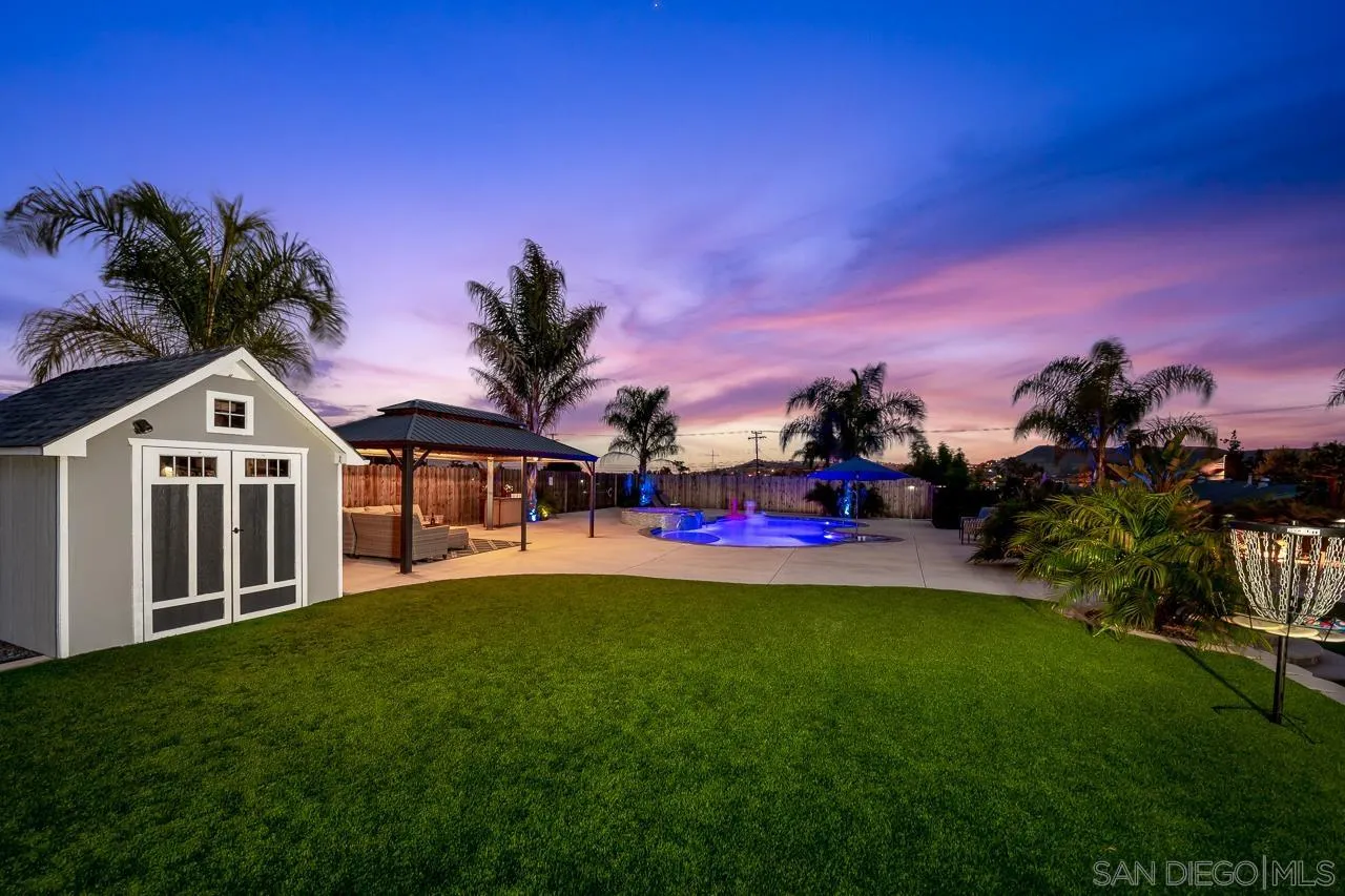 9311 Oakbourne Road Santee, CA 92071 - Photo 54 of 64 a view of a house with a big yard