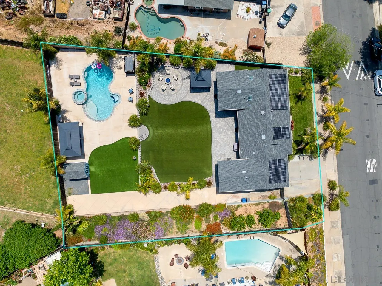 9311 Oakbourne Road Santee, CA 92071 - Photo 59 of 64 an aerial view of a house with a yard and pool